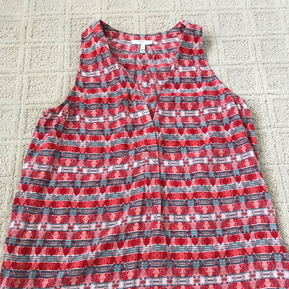 RED SLEEVELESS SHIRT